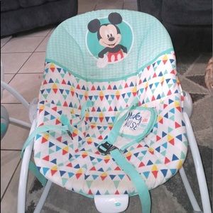All baby toys and bouncy chair and baby bath